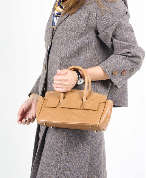 soft leather mini carryall with structured flap detail – CAMELIA