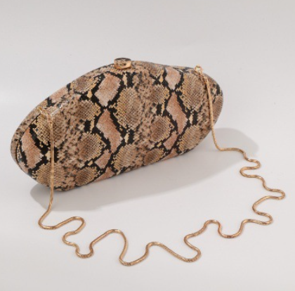 python-effect oval clutch with metallic clasp – VESPER