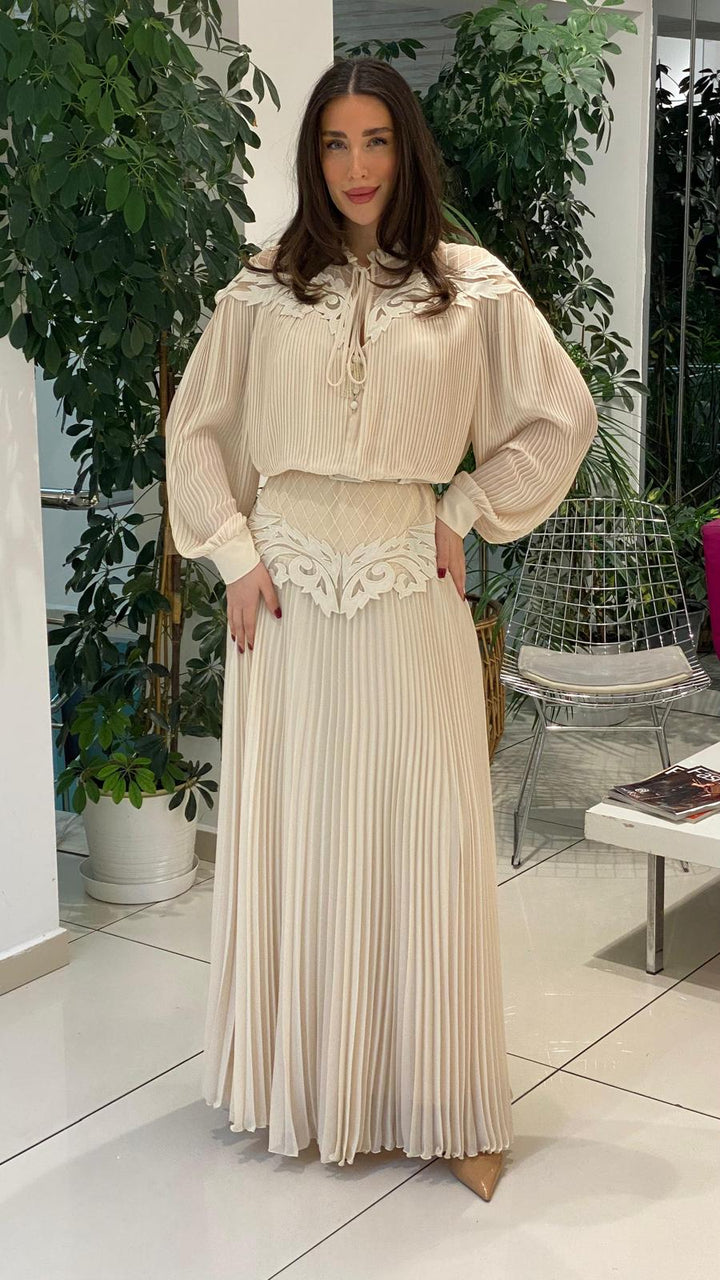 pleated maxi dress with embroidered neckline and waist detail – ODD- ELYSEE